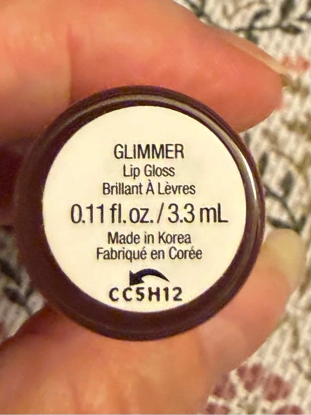 Rare Beauty Glimmer Lip Gloss in Shimmery Deep Coral Pink
